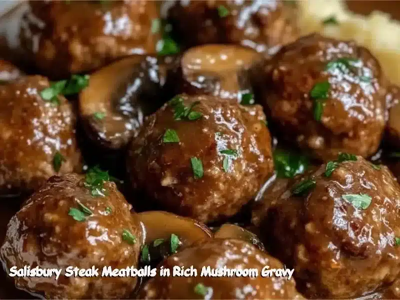 Salisbury steak meatballs in rich mushroom gravy on a white plate