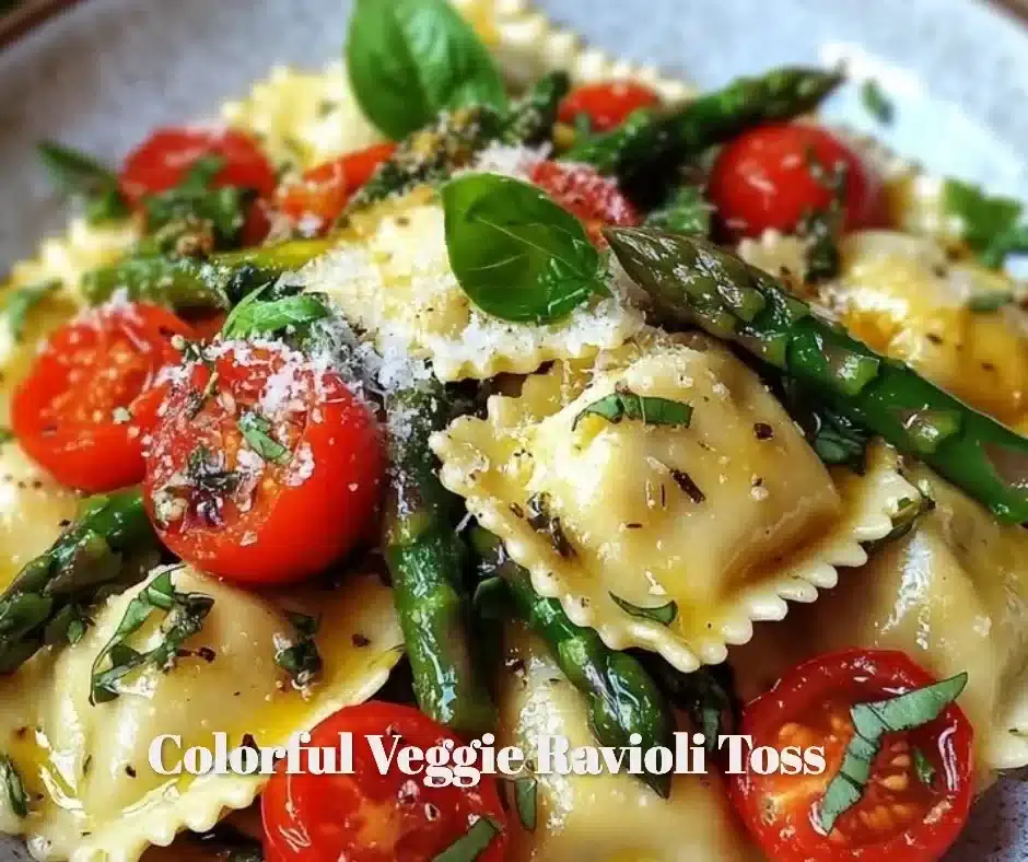 Colorful veggie ravioli toss with fresh vegetables and herbs in a bowl.