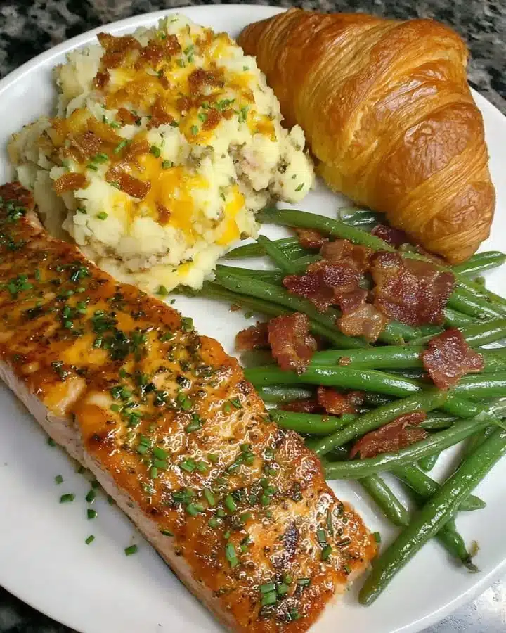 Honey glazed salmon dinner plate with vegetables and grains