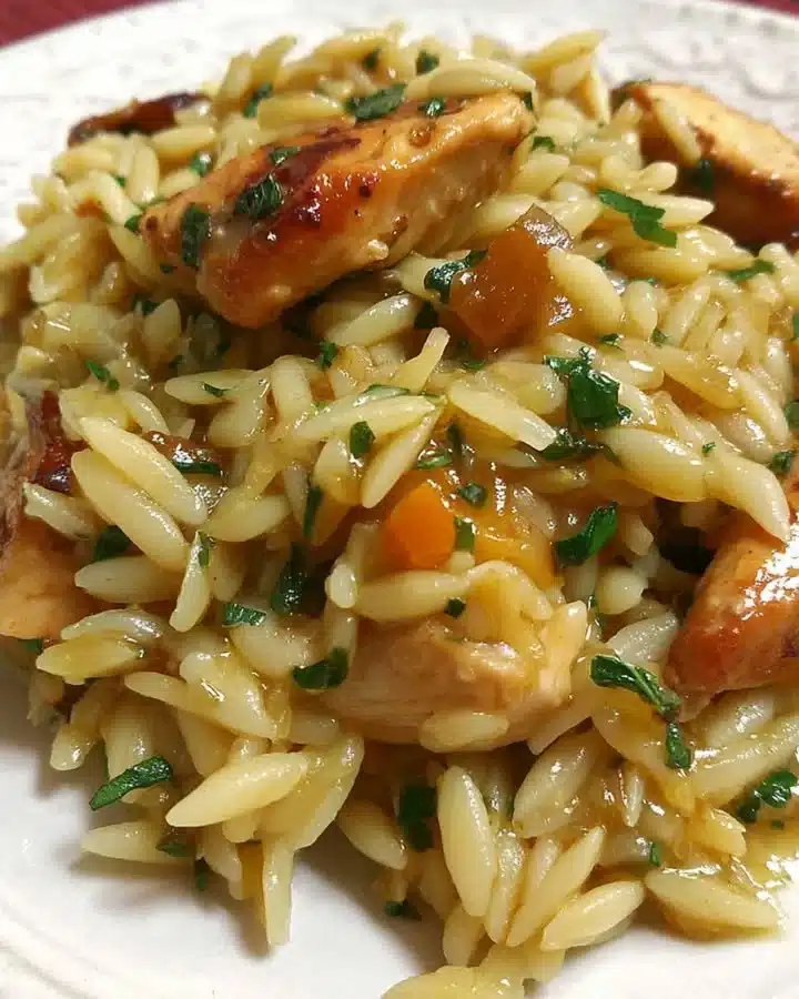 Lemon Chicken Orzo Skillet with fresh herbs and vibrant flavors