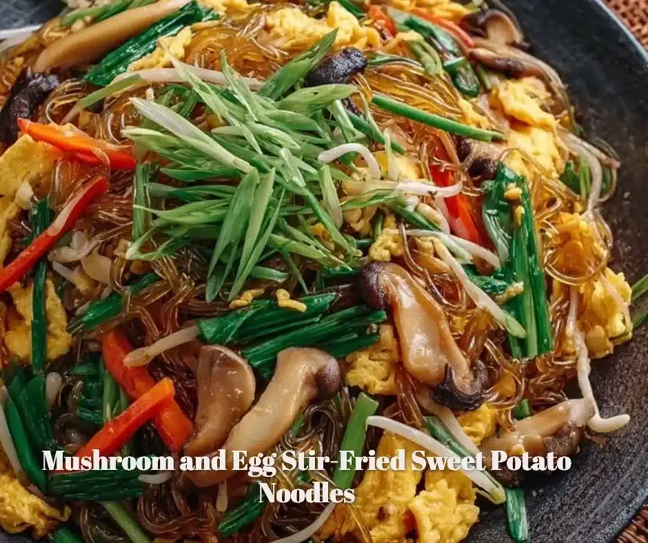 Mushroom and egg stir-fry with sweet potato noodles served in a bowl