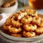 Delicious eggnog waffles topped with whipped cream and festive spices