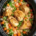 Crockpot chicken fried rice ready to serve, featuring colorful vegetables and tender chicken