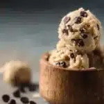 Bowl of chocolate chip edible cookie dough for one with a spoon