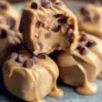 Frozen Greek yogurt peanut butter bites in a bowl, a healthy snack option.