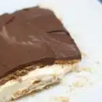 No-bake chocolate eclair cake topped with chocolate frosting