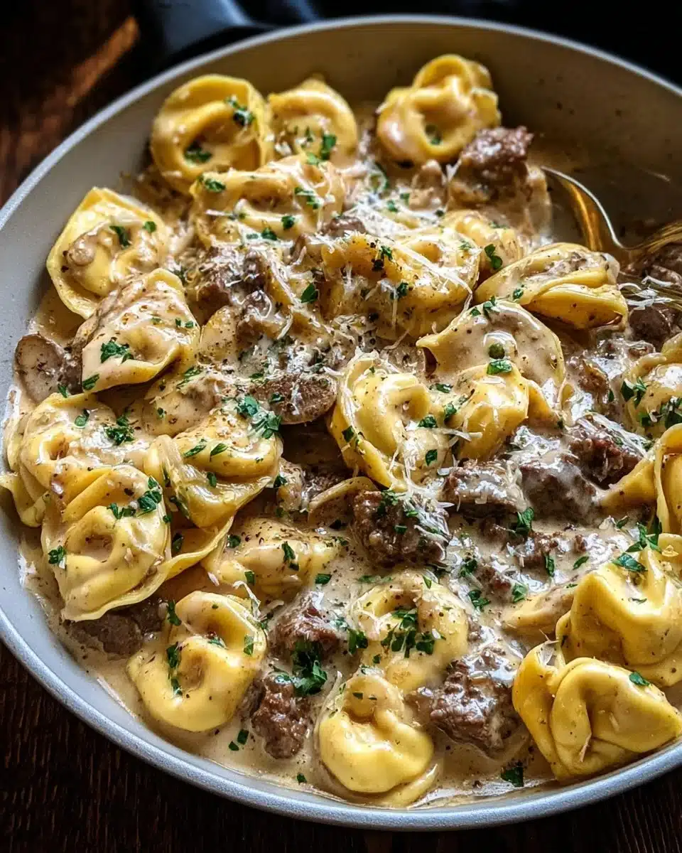 Quick 30-minute creamy beef stroganoff tortellini in a skillet