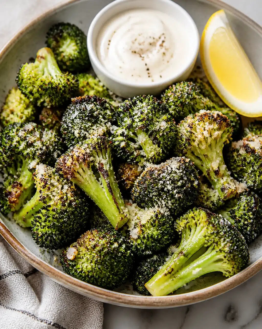 Crispy Air Fryer Garlic Parmesan Broccoli served on a plate