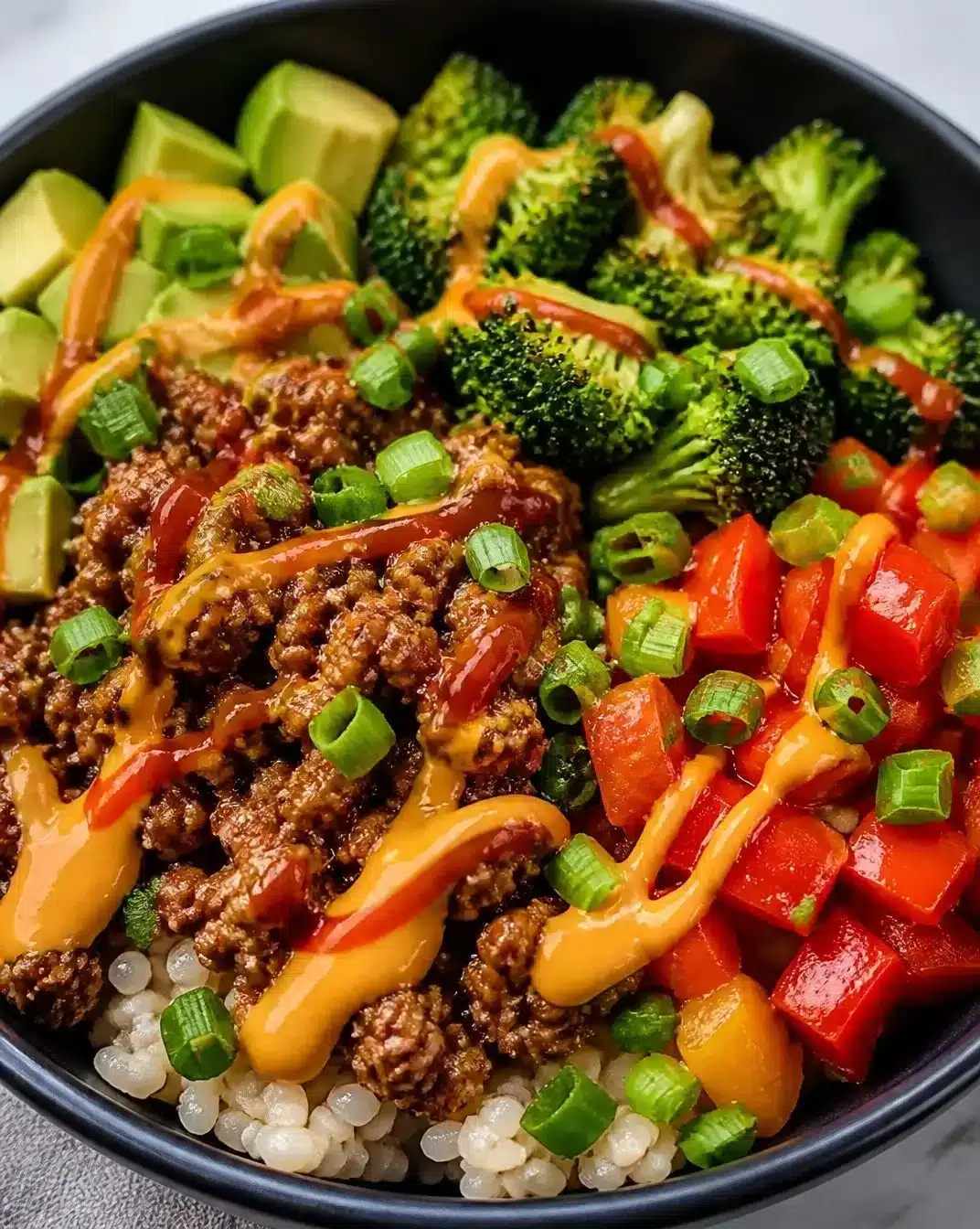 Delicious Bang Bang Bowls featuring Ground Turkey and colorful vegetables.