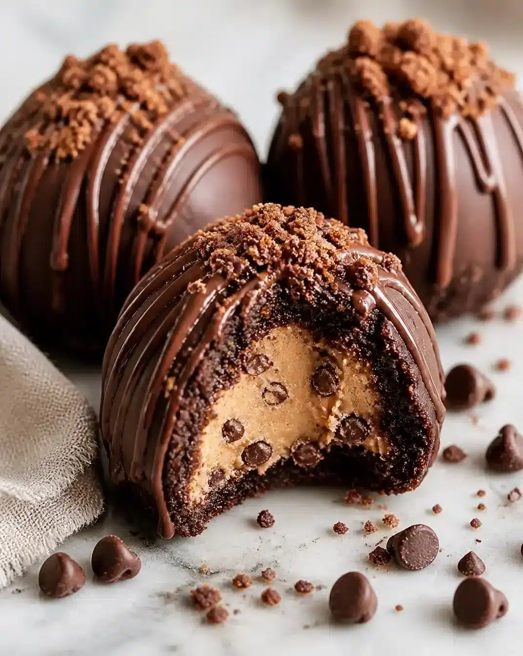 Delicious cookie dough-stuffed brownie bombs ready to be enjoyed