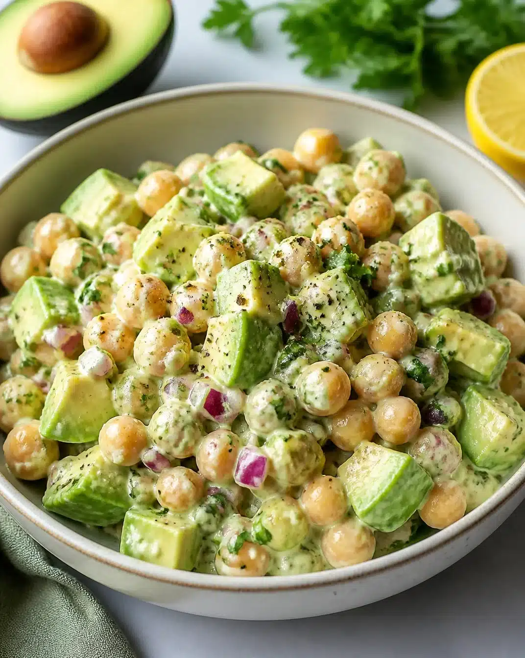 Creamy Chickpea and Avocado Salad with fresh ingredients in a bowl