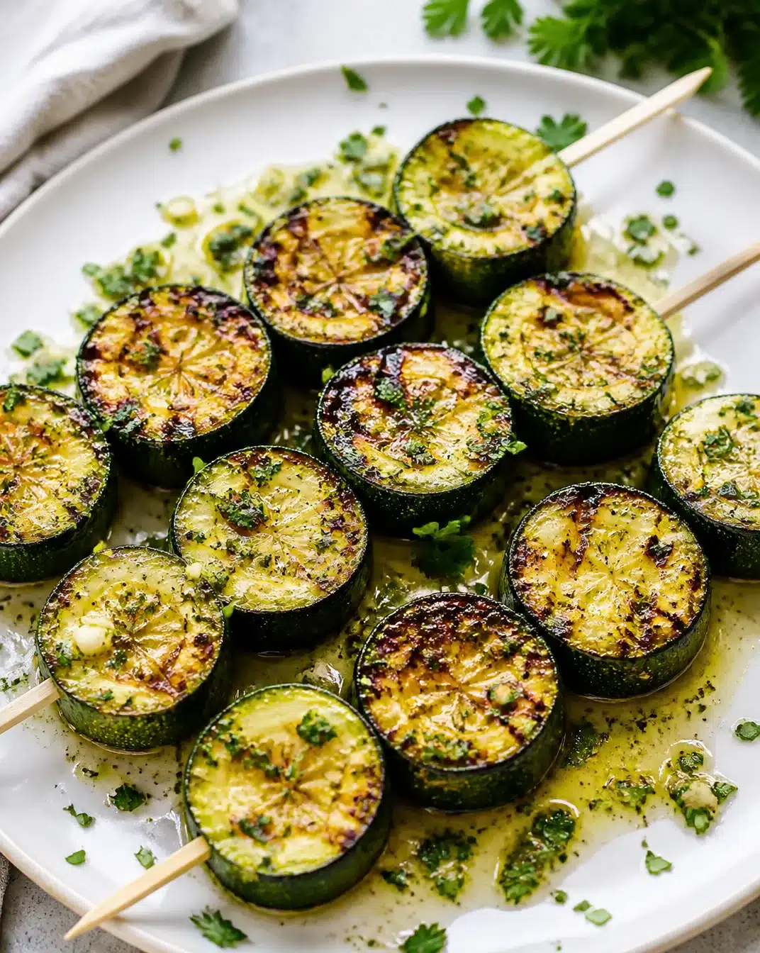 Garlic Butter Grilled Zucchini Skewers on a grill