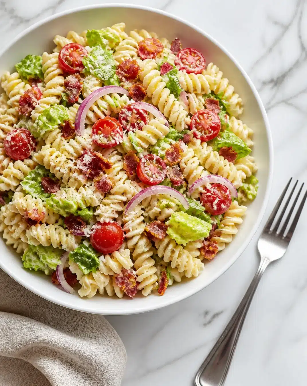 Delicious Ranch BLT Pasta Salad served in a bowl with fresh ingredients.
