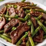 Sizzling Garlic Beef with Green Beans, Blackstone-Style 2 sizzling garlic beef with green beans blackstone 2026 05 30 211332 817x1024 1
