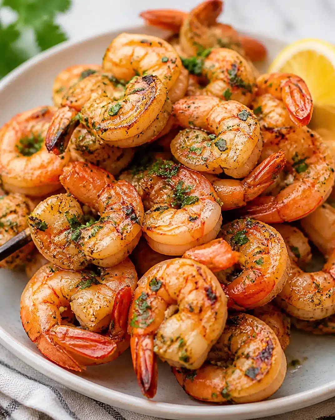 Delicious tangy garlic grilled shrimp kabobs on the grill
