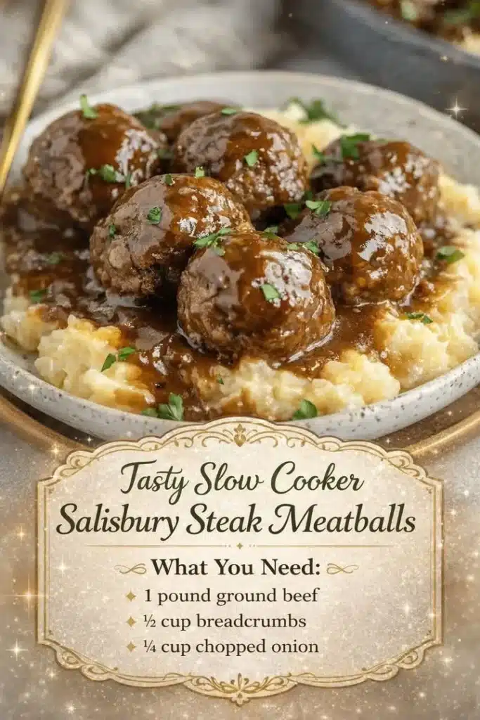 Slow cooker Salisbury steak meatballs served on a plate with gravy and mashed potatoes.